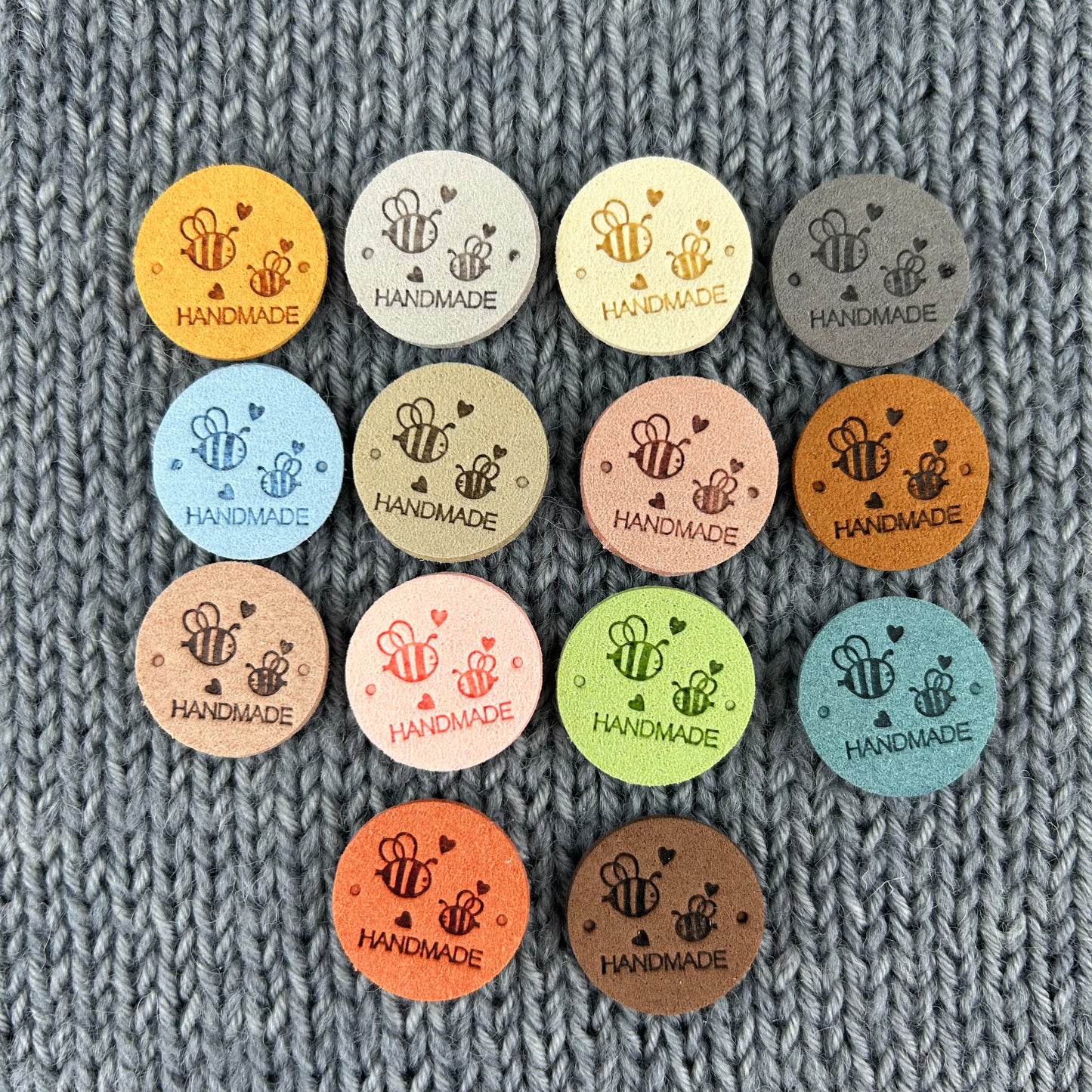 14 Round Bee Labels “Hand Made”, made from PU Pleather Faux Suede. Clothing Sew On Tags for Knitted, Crochet or Sewn Garments, Craft labels.