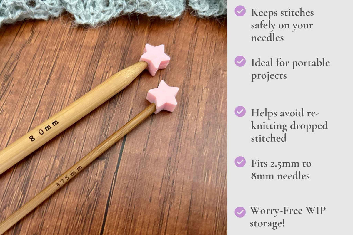 Two wooden knitting needles with pink star-shaped needle tips displayed on a wooden surface next to a text panel highlighting product features for knitting needle stoppers. It reads: Keeps stitches on needles. Ideal for portable projects. Helps avoid re-knitting dropped stitches. Fits mm to 2.5mm to 8mm needles .